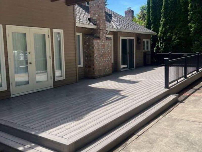 Composite deck with black metal railing